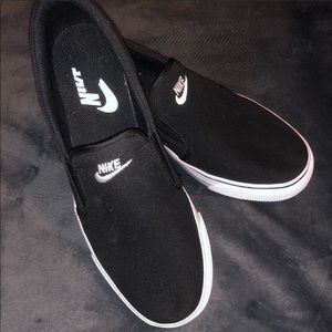 Black Nike Slip On’s